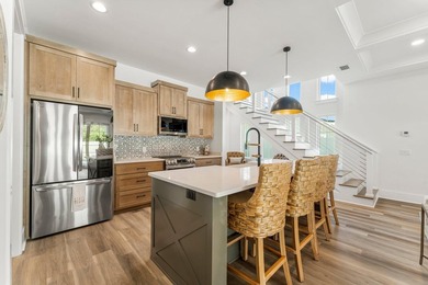 Welcome to your turnkey coastal haven at 322 Sea Breeze Drive, a - photo 13