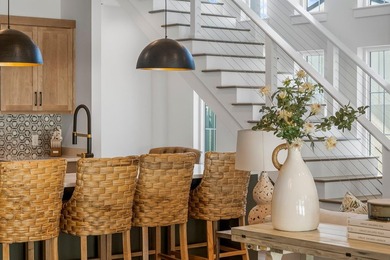 Welcome to your turnkey coastal haven at 322 Sea Breeze Drive, a - photo 14