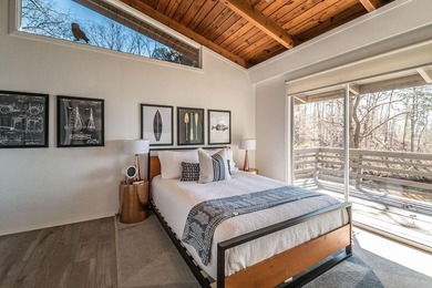 A mid-century modern lake home with breath taking wide views of - photo 14