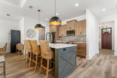 Welcome to your turnkey coastal haven at 322 Sea Breeze Drive, a - photo 15