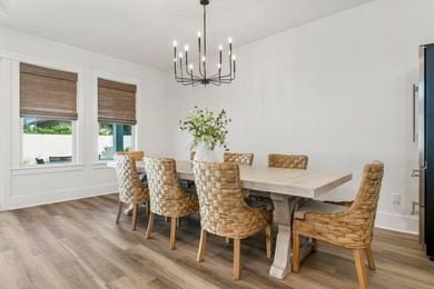 Welcome to your turnkey coastal haven at 322 Sea Breeze Drive, a - photo 16