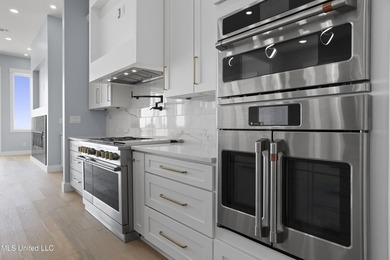 Introducing the First Sand Beach Homes in Biloxi, offering a - photo 16