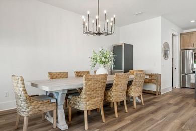 Welcome to your turnkey coastal haven at 322 Sea Breeze Drive, a - photo 18