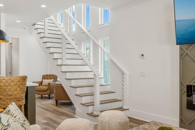 Welcome to your turnkey coastal haven at 322 Sea Breeze Drive, a - photo 24