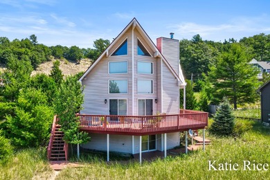Welcome to your ultimate lakeside sanctuary. Situated on a - photo 1
