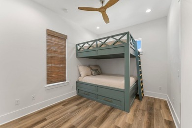 Welcome to your turnkey coastal haven at 322 Sea Breeze Drive, a - photo 32