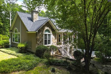 Nestled among nearly two acres of mature old-growth hardwoods in - photo 2