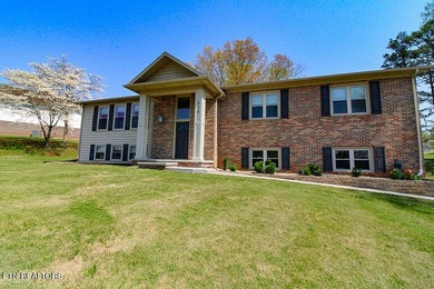Welcome home to this spacious 5BR/3BA split foyer on a level lot - photo 2