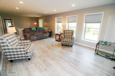 Welcome home to this spacious 5BR/3BA split foyer on a level lot - photo 3