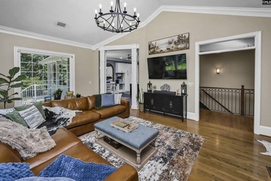 Nestled among nearly two acres of mature old-growth hardwoods in - photo 10