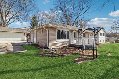 Situated on a .26-acre corner lot with mature surroundings, this