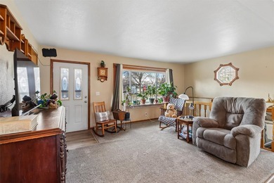 Situated on a .26-acre corner lot with mature surroundings, this