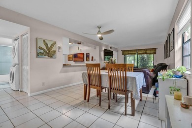 Location is everything! This 3-bedroom, 2-bath condo in Windwood - photo 4