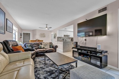 Location is everything! This 3-bedroom, 2-bath condo in Windwood - photo 9