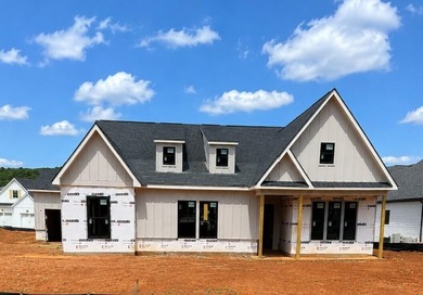 Experience the ease and elegance of true one-level living in - photo 2