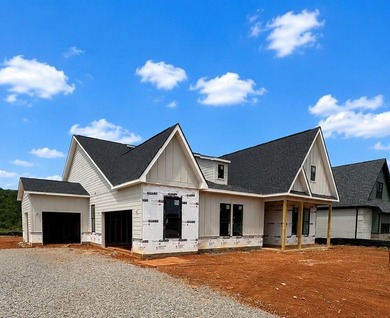 Experience the ease and elegance of true one-level living in - photo 3