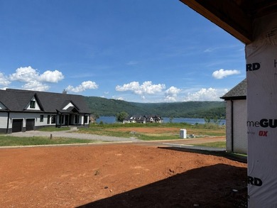 Experience the ease and elegance of true one-level living in - photo 5