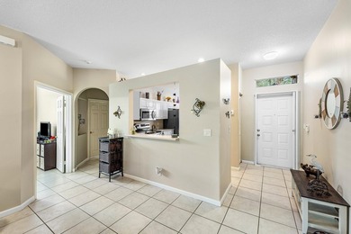 THIS METICULOUSLY MAINTAINED VILLA FLOWS EFFORTLESSLY FROM ROOM - photo 4