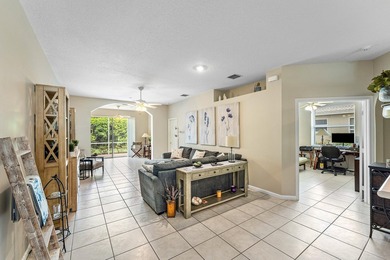 THIS METICULOUSLY MAINTAINED VILLA FLOWS EFFORTLESSLY FROM ROOM - photo 10