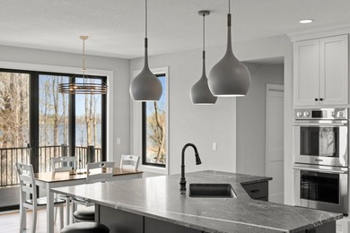 Custom built in 2022 by Gonyea Homes, this property occupies one - photo 11