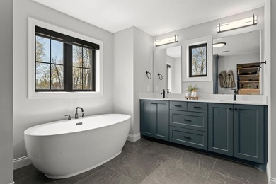 Custom built in 2022 by Gonyea Homes, this property occupies one - photo 19