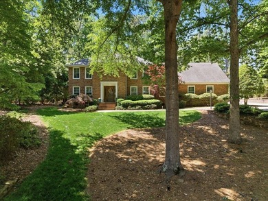 Tucked away on a quiet cul-de-sac in the gated community of the - photo 2