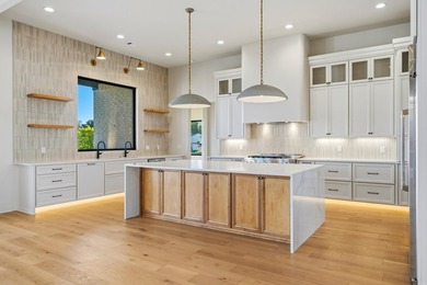 Experience luxury waterfront living in this custom new - photo 11