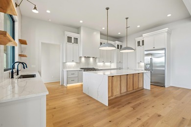 Experience luxury waterfront living in this custom new - photo 12