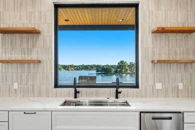 Experience luxury waterfront living in this custom new - photo 15