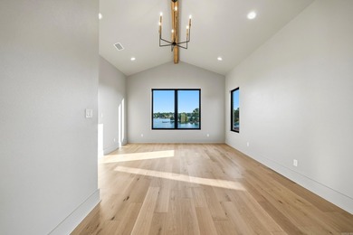 Experience luxury waterfront living in this custom new - photo 19