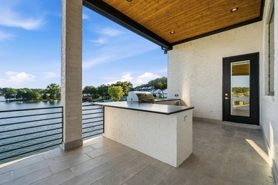 Experience luxury waterfront living in this custom new - photo 30