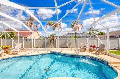 Tropical 4/2/2 pool home in desirable Southbend Lakes! This - photo 33
