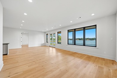 Experience luxury waterfront living in this custom new - photo 35