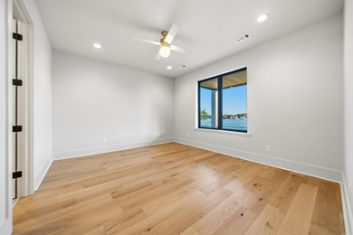 Experience luxury waterfront living in this custom new - photo 37