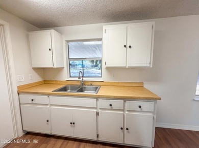 Situated on a corner lot, 4240 Key Vega Ct features a covered - photo 7