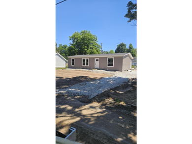new home must see very nice close to town schools 2 miles from - photo 1