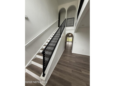Welcome home to this beautifully remodeled home, sitting on a - photo 3