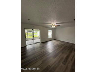 Welcome home to this beautifully remodeled home, sitting on a - photo 7