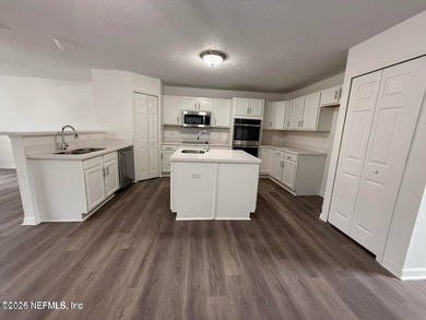 Welcome home to this beautifully remodeled home, sitting on a - photo 8
