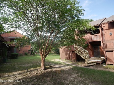 This move-in-ready condominium is ideally located in a desirable - photo 2