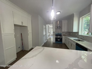 A unique gem! Gorgeous 2 family new construction. This - photo 11