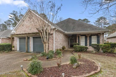 This charming brick-front home in the exclusive gated community - photo 2
