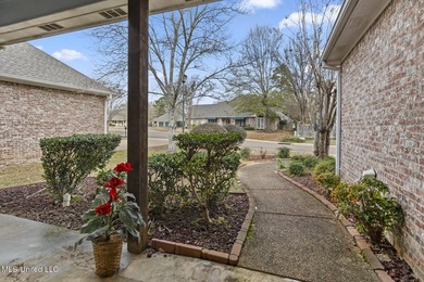 This charming brick-front home in the exclusive gated community - photo 3