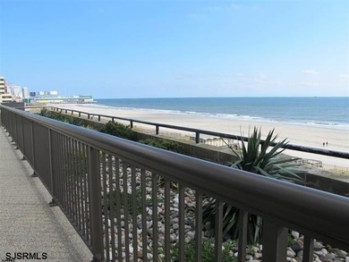 This beautiful condo features stunning views of the beach, ocean