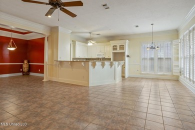 This charming brick-front home in the exclusive gated community - photo 6