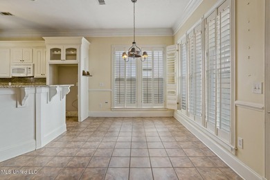 This charming brick-front home in the exclusive gated community - photo 8