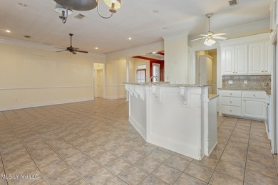This charming brick-front home in the exclusive gated community - photo 9