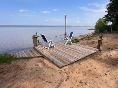 St. Marys River Home For Sale in Sault Sainte Marie Michigan