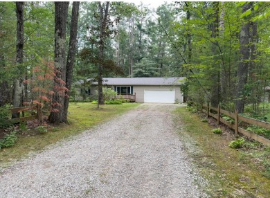 Lake Home For Sale in Lewiston, Michigan
