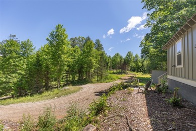 Welcome to Bearfoot Cabin, a charming mountain retreat perched - photo 12